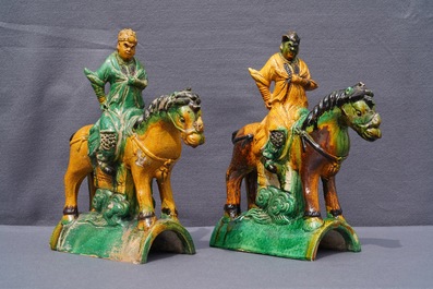 Two Chinese yellow and green-glazed 'horserider' roof tiles, Ming